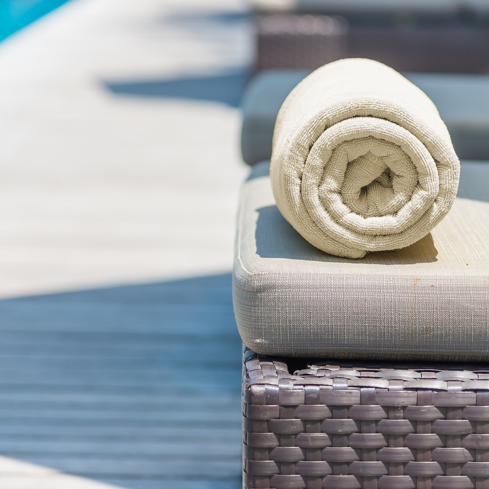 Ivory Beach Towel on stand