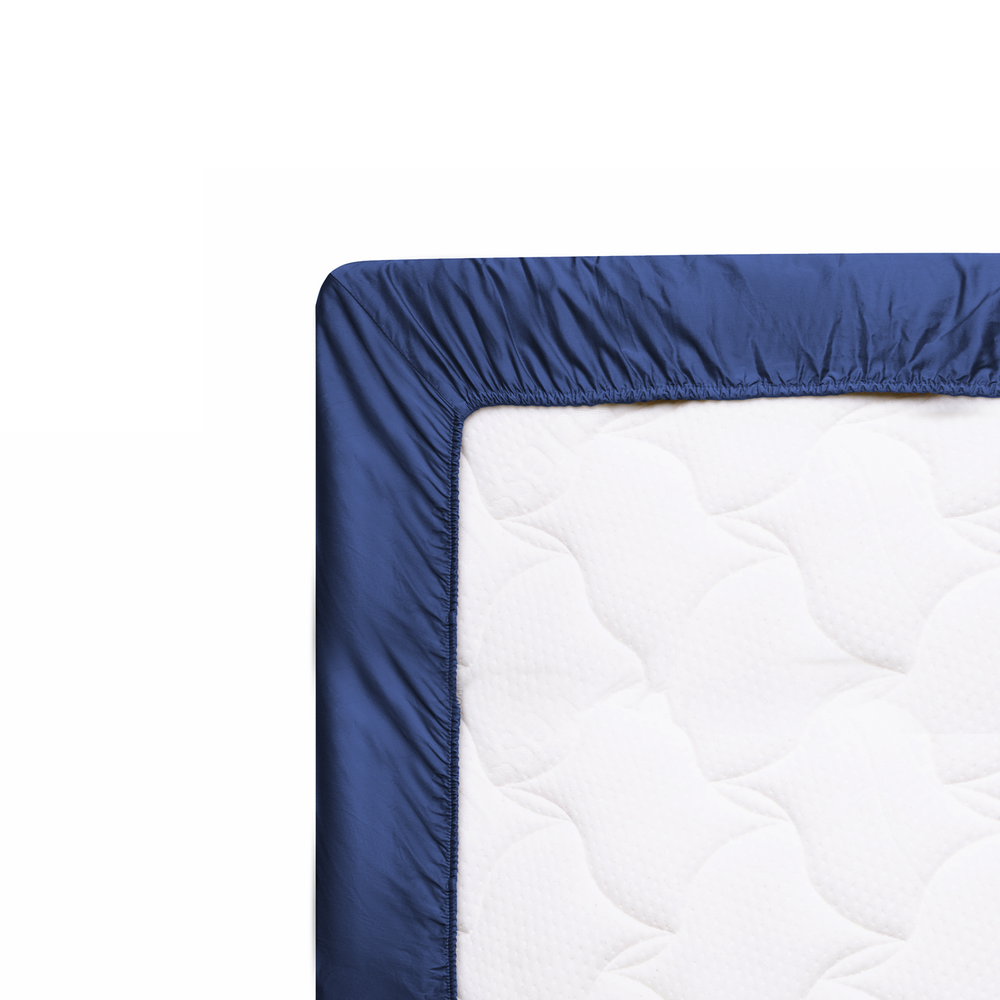 Solid Indigo Blue Fitted Sheet Wrap On Mattress