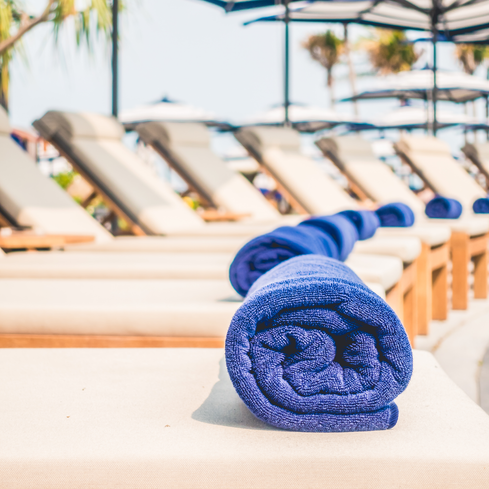 Royal Blue Beach Towel on bath chair