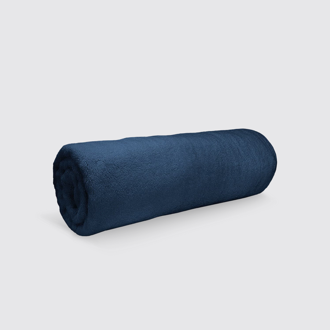 Folded Navy Blue Beach Towel